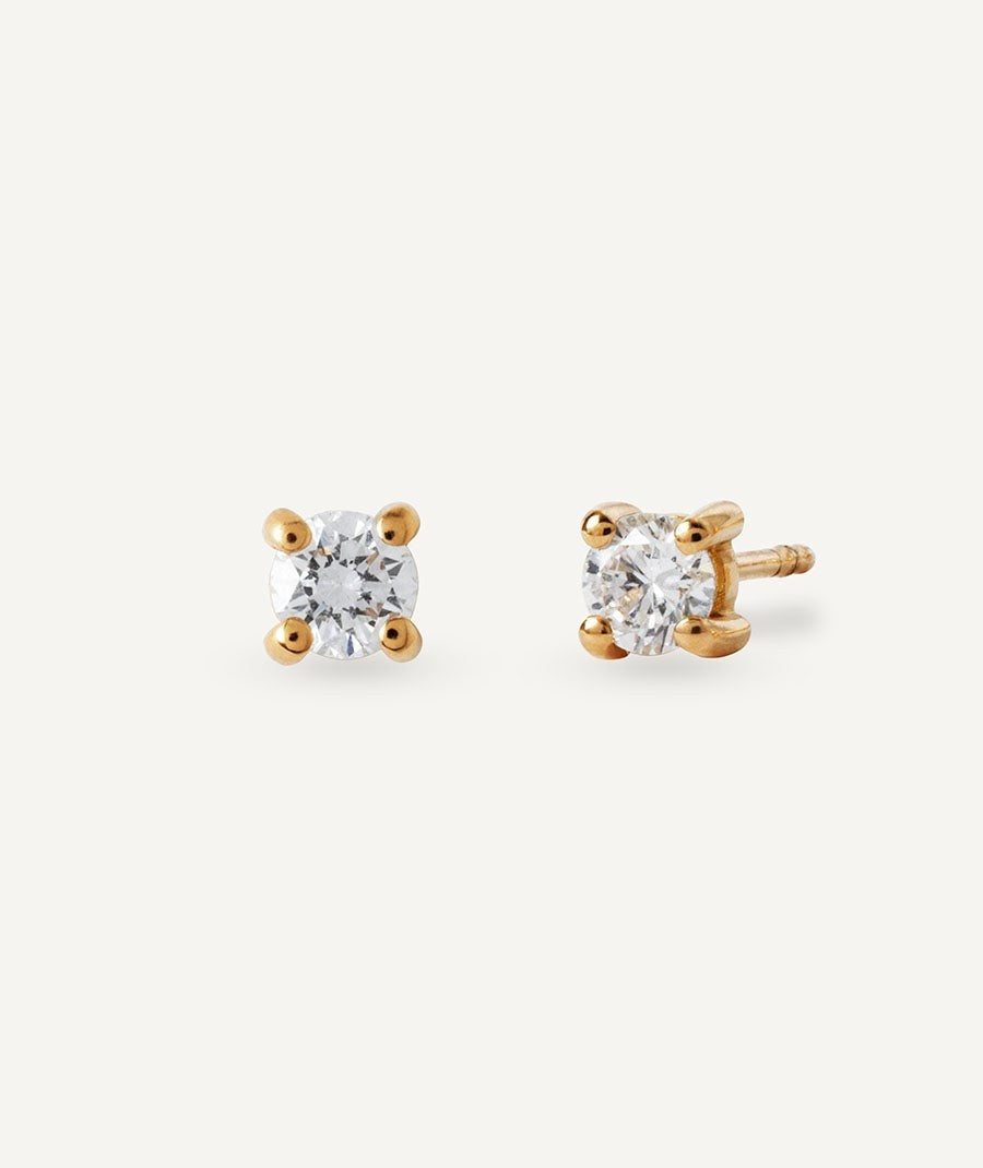 Pendientes de diamantes y oro solitario