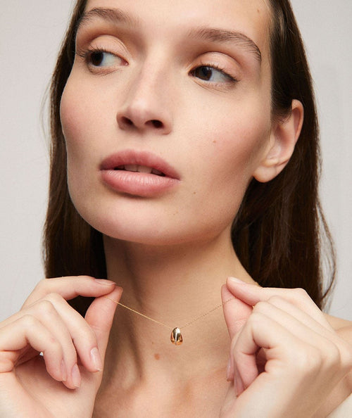 Collar de diamantes y oro drop secundaria