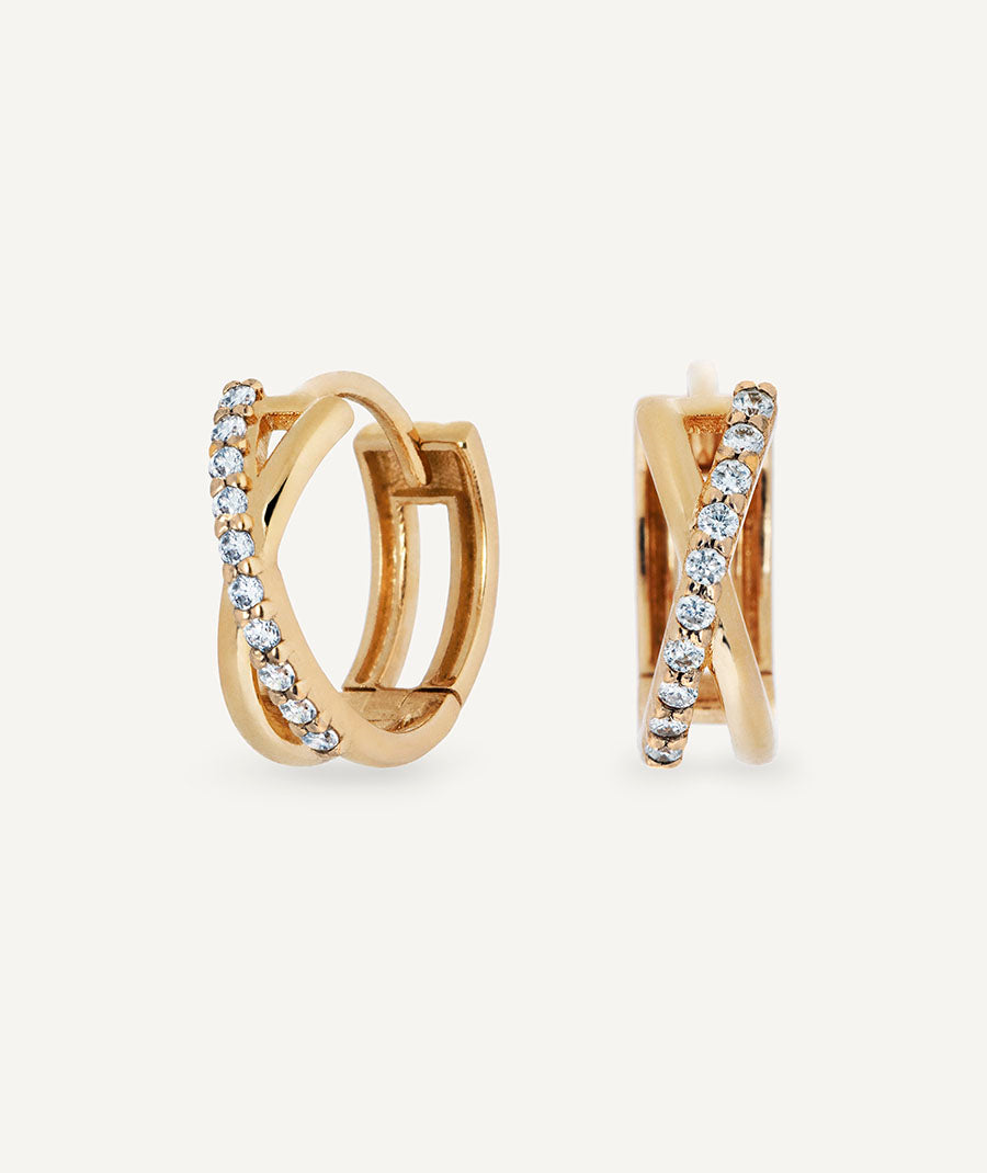 Intertwined diamond and gold earrings