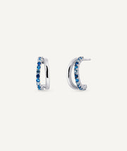 Pendientes semiluna abiertos con circonitas azules