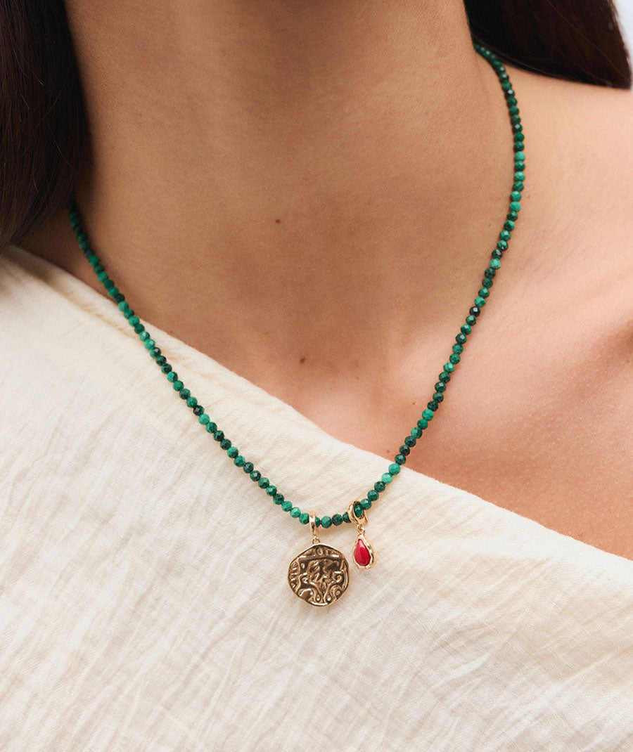 Charm Moneda